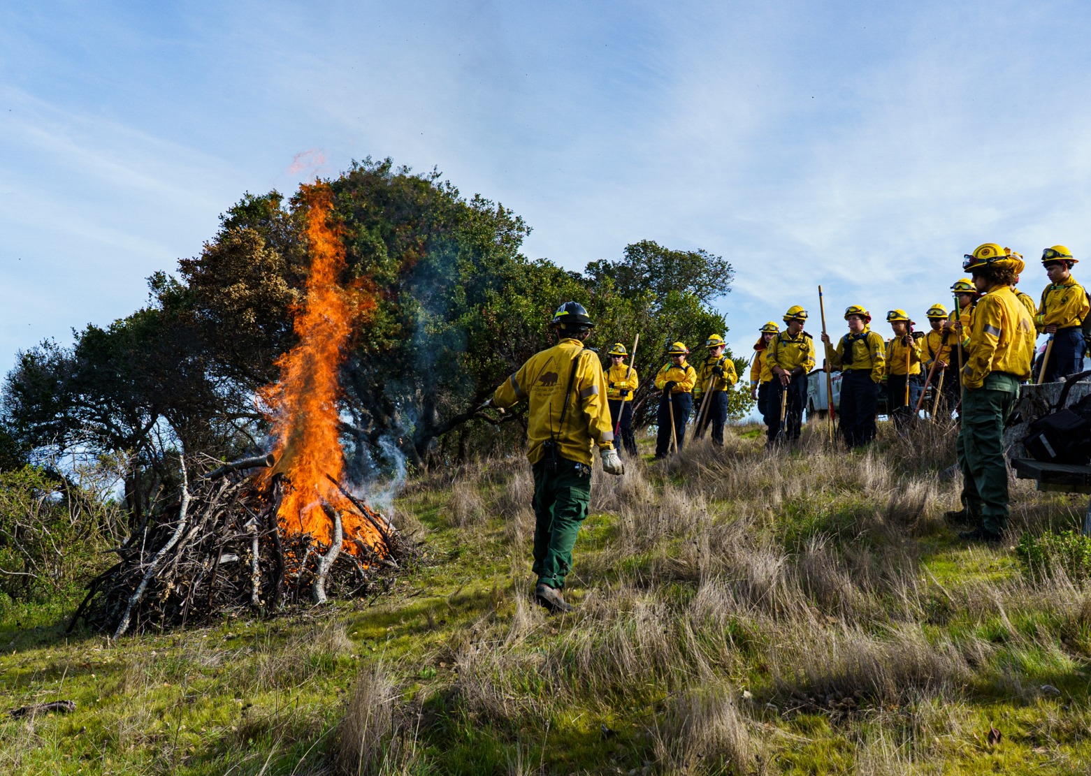 Firefighters observing a Pile Burn